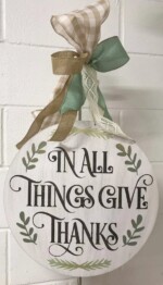 Door Hanger $45 *Bow is not included in the price but can be added on at the event for an additional cost.