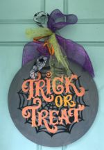 Door Hanger $45 *Bow is not included in the price but can be added on at the event for an additional cost.